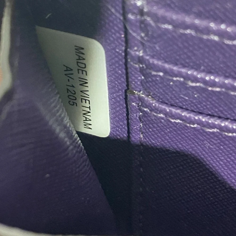 Michael Kors Purple Textured Clutch Wristlet.